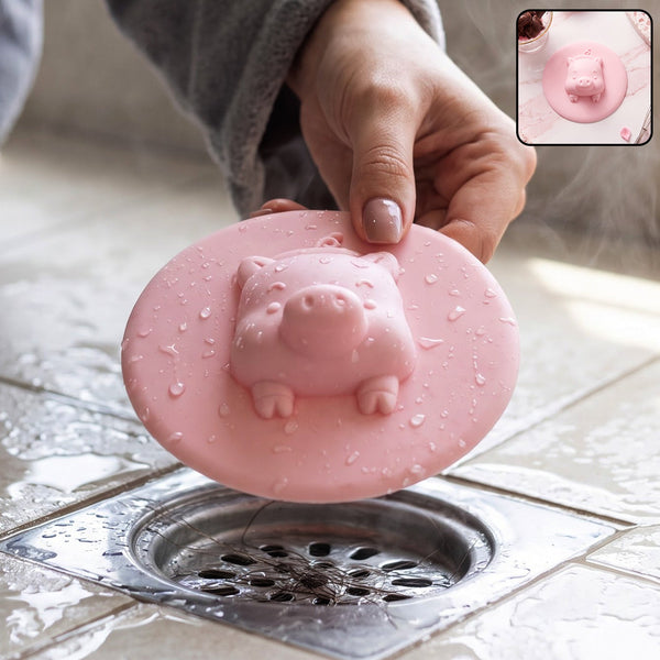 Silicone pig design floor drain cover in a bathroom setting, effectively covering the drain.