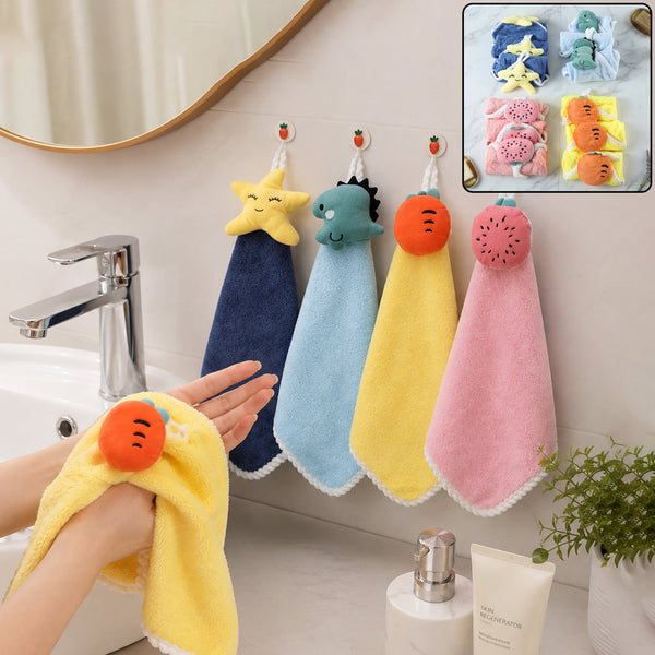 A person drying hands with a yellow carrot-shaped towel, with three other colorful animal-shaped towels hanging on hooks.